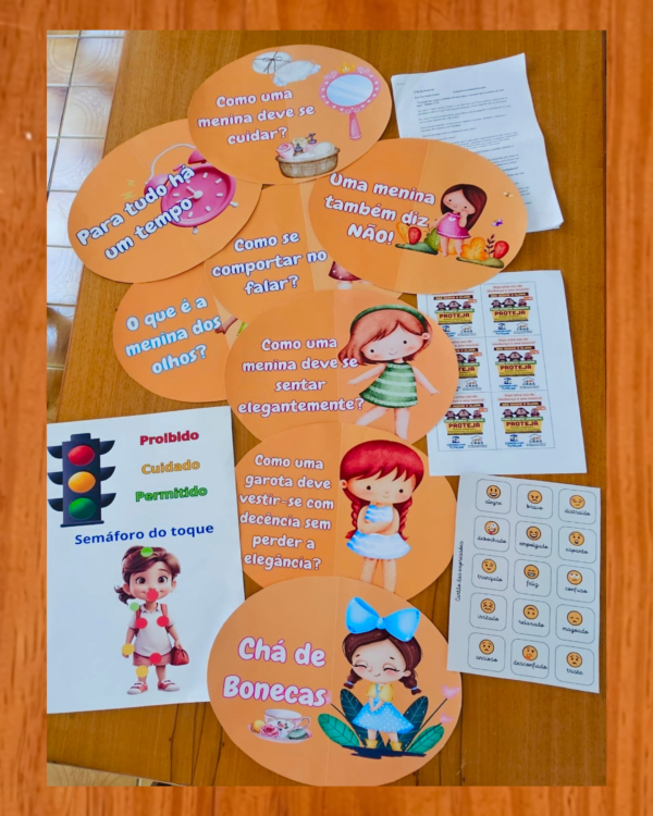 Maio Laranja: Chá de Bonecas - Menina dos Olhos de Deus